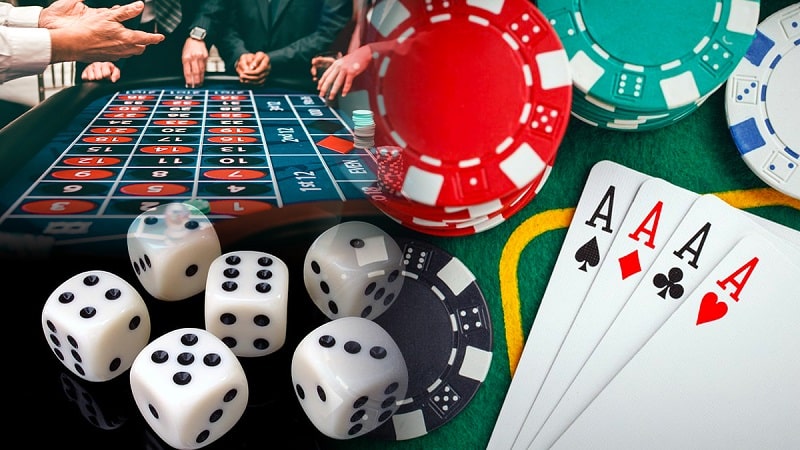 Dice, chips and cards on a live casino table